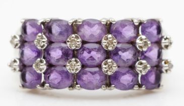 A 9ct white gold amethyst and eight cut diamond cluster ring, N-O, 3.7gm.