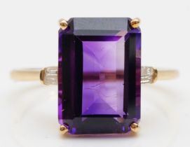 A 9ct gold emerald cut amethyst cocktail ring, with baguette cut diamonds to the shoulders, R-S, 3.