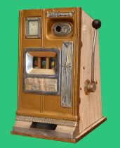 Deluxe, a mechanical three reel slot machine, c.1960's, aluminum case plays 1d, 68 x 40 x 40cm. No