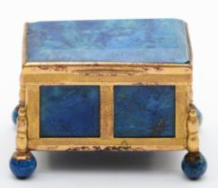 A 19th century gilt metal and lapis lazuli casket, raised on ball feet, 5 x 3.5 x 4cm
