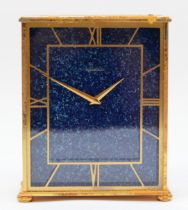 Jaeger-LeCoultre, a 20th century gilt metal cased mantle time piece, with lapis lazuli effect