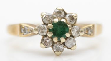 A vintage 9ct gold, emerald and brilliant cut diamond cluster ring, M, 2.3gm.