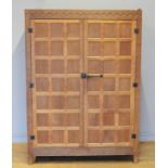 Peter 'Rabbitman' Heap of Wetwang, a 20th century carved oak panelled twin door wardrobe/hall