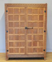 Peter 'Rabbitman' Heap of Wetwang, a 20th century carved oak panelled twin door wardrobe/hall