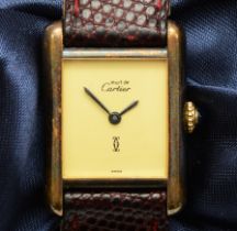 Must de Cartier, a silver gilt quartz ladies wristwatch, cream dial with no numerals, the case