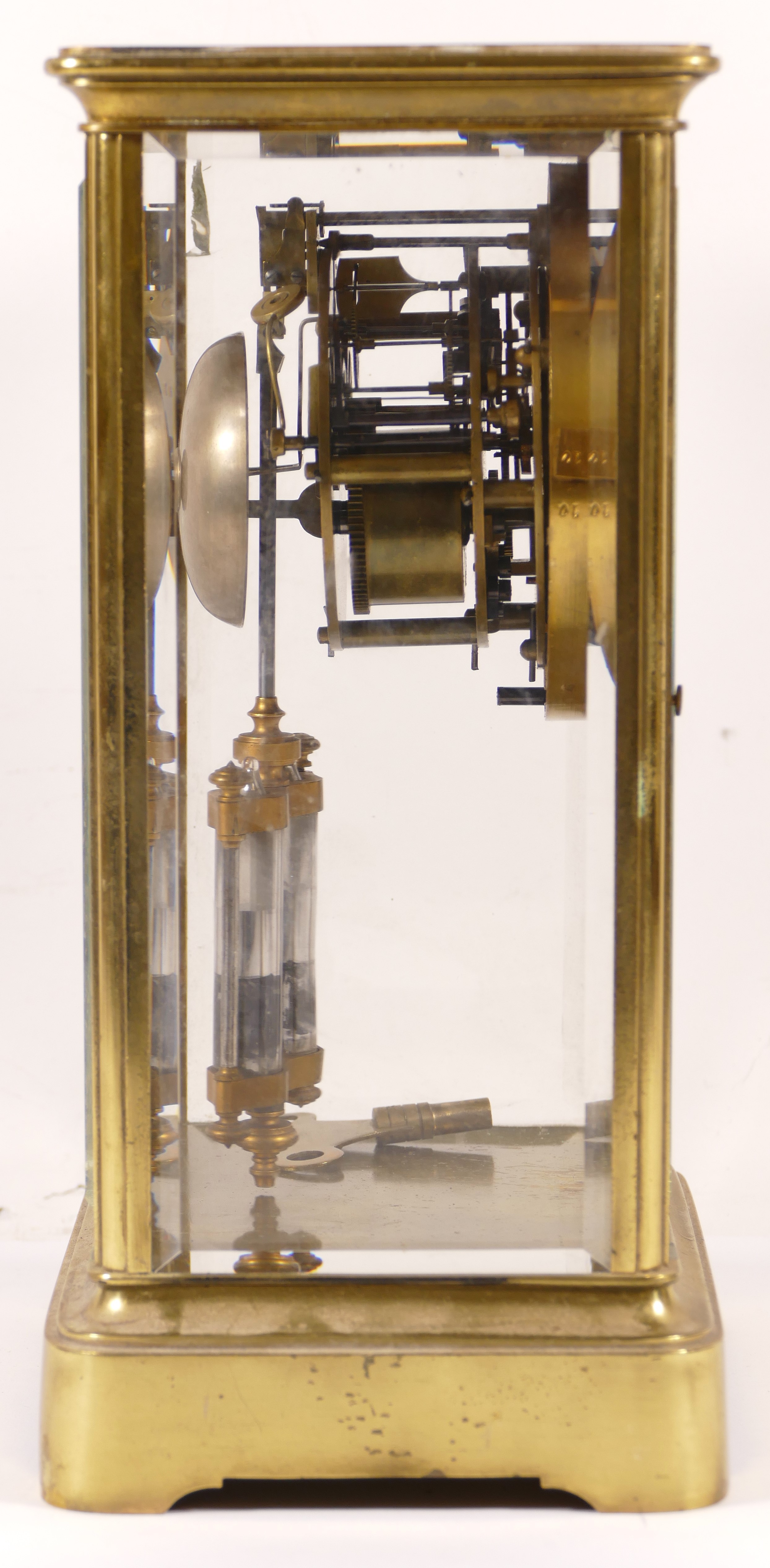 A late 19th/early 20th century brass corniche and four glass mantle clock, the white enamelled - Image 4 of 4