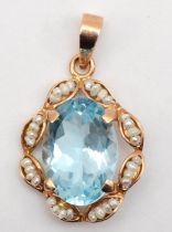 A 585 gold topaz and seed pearl pendant, topaz 20 x 11mm, 2.8gm.