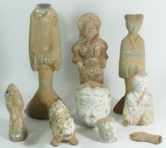 A Chinese tomb figure, Han Dynasty, (206BC - 220AD), together with other tomb figures. Provenance;