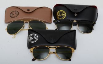Three pairs of vintage Ray Ban sunglasses, Aviator 62/14, 65/19 and Bausch & Lomb Ray Ban Signet,