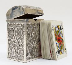 A Victorian silver playing card case, by Nathan and Hayes, Chester 1899, with embossed decoration of