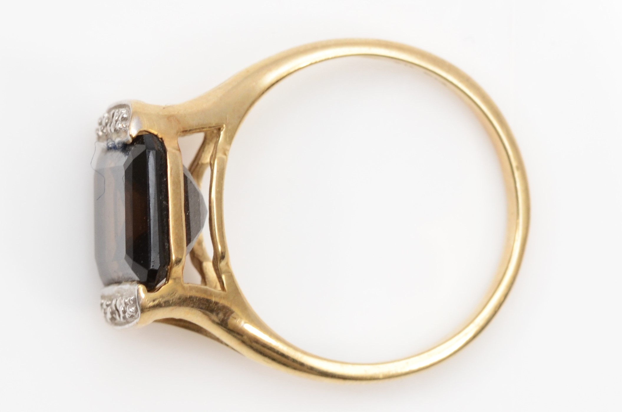 A 9ct gold emerald cut smokey quartz dress ring, the quartz flanked by two illusion set diamonds, P, - Image 2 of 2