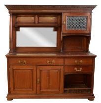 A late 19th century mahogany bevel edged mirror backed sideboard, possibly by Heals, with blind