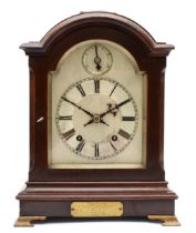 A 20th century Georgian style mahogany cased 8 day mantle clock, the brushed silvered dial with