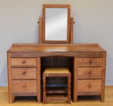 Peter 'Rabbitman' Heap of Wetwang, a mid 20th century adzed oak mirror back twin pedestal dressing