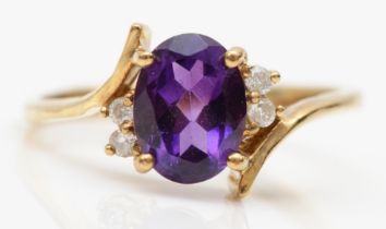 A 375 gold amethyst and brilliant cut diamond dress ring, N, 3.7gm.