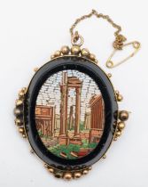 A 19th century unmarked gold micromosaic brooch depicting ruins, 5 x 4 cm, 19.5gm.