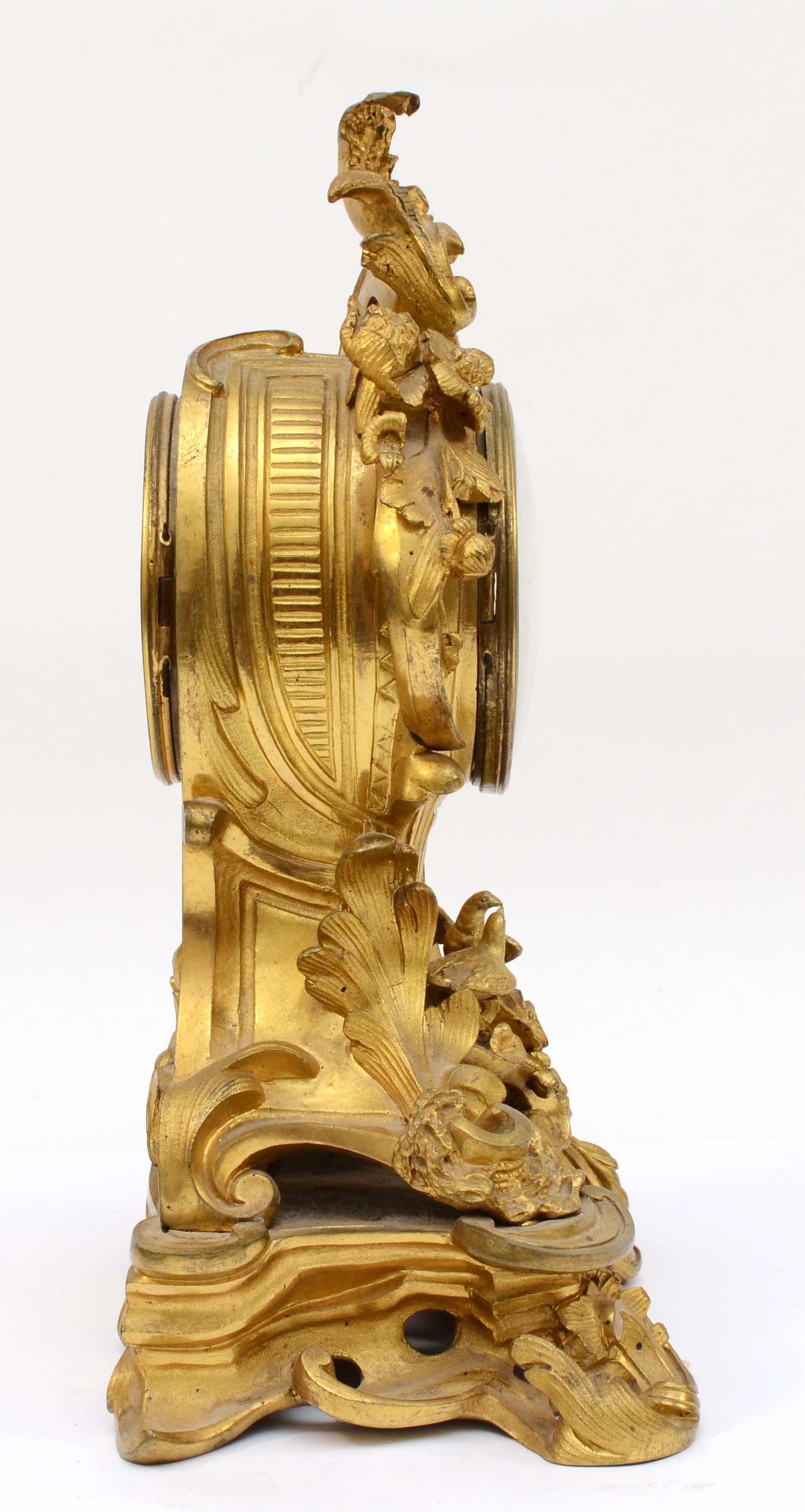 A late 19th century, probably French gilt brass mantle clock, the gilt dial with applied enamel - Image 5 of 6