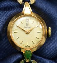Tudor, A 18k gold cased manual wind ladies wristwatch, the signed champagne dial with baton and