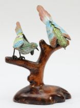 A pair of 20th century Chinese silver and cloisonné enamel birds on a wooden base, stamped silver