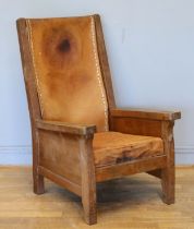 Robert 'Mouseman' Thompson, a mid 20th century carved oak smoking chair with brown leather back