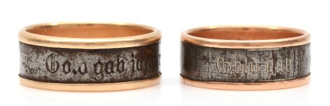 Two German gold and steel wedding bands, the larger inscribed to outer band 'Gold gab ich für