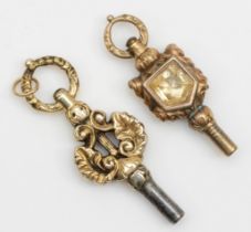 Two Victorian unmarked gold cased pocket watch keys.