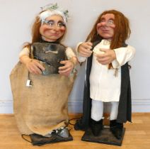A husband and wife Troll automaton, with moving resin heads and arms, 95cm