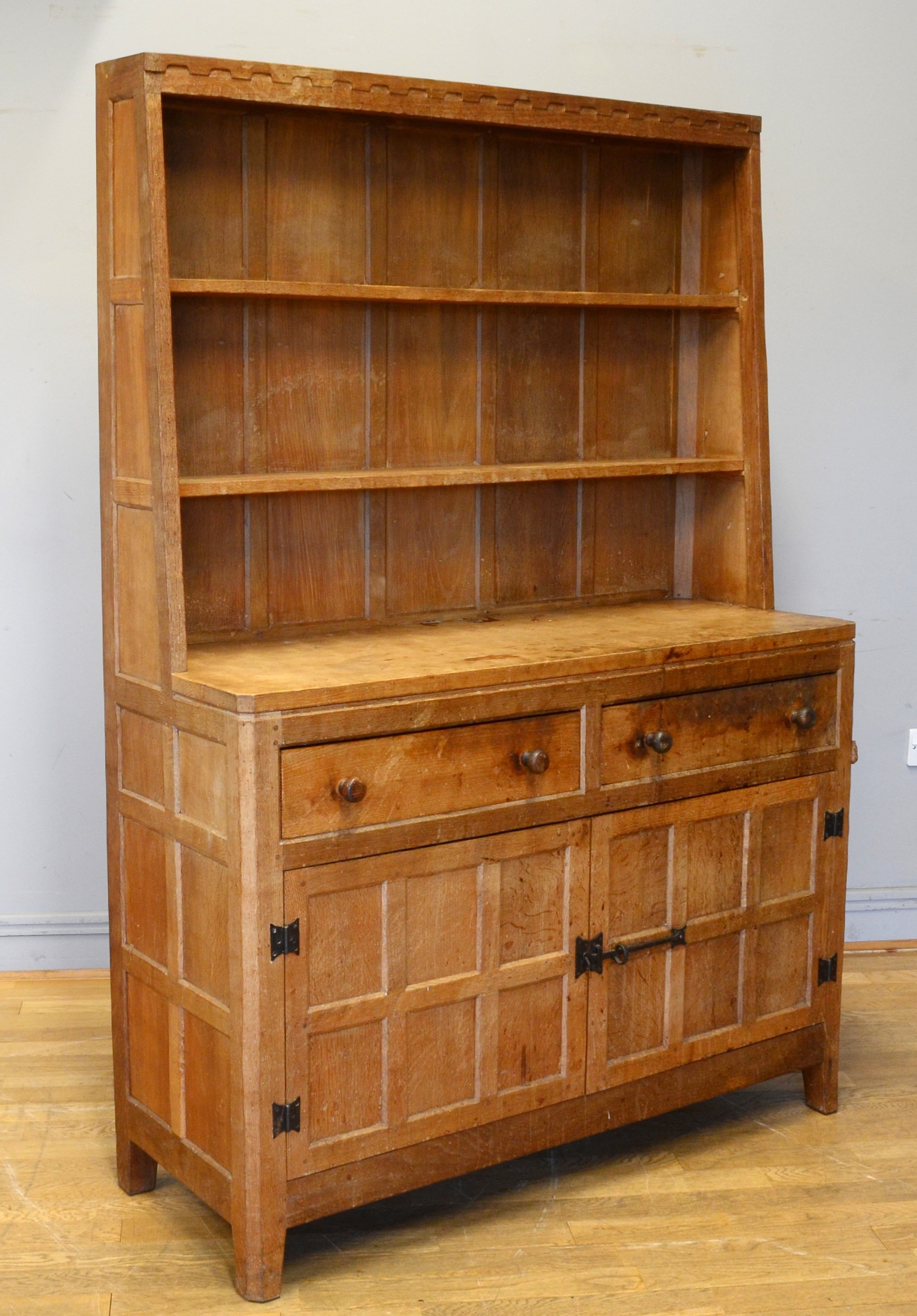 Peter 'Rabbitman' Heap, a mid 20th century adzed oak Welsh style dresser, the panelled upper section - Image 4 of 4