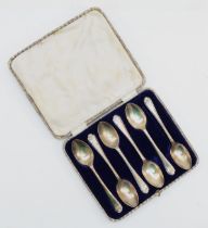 A George V set of six silver tea spoons, by Walker & Hall, Sheffield 1933, with golfing finials, 2.