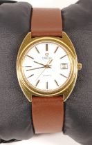 Omega, quartz, a gold plated date gentleman's wristwatch, silvered dial with baton markers, 34mm.