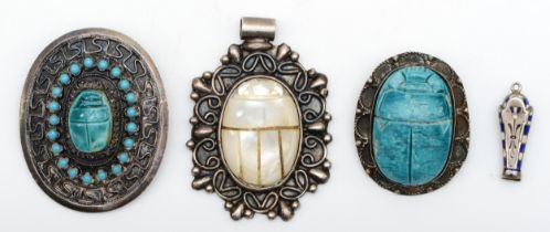 An early to mid 20th century Egyptian silver brooch set with a faience scarab beetle, 28 x 18mm,