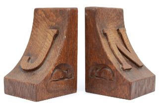 Robert 'Mouseman' Thompson of Kilburn, a pair of mid 20th carved oak adzed bookends, each with