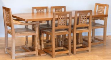 A Peter 'Rabbitman' Heap of Wetwang oak dining suite, comprising refectory table with adzed oblong