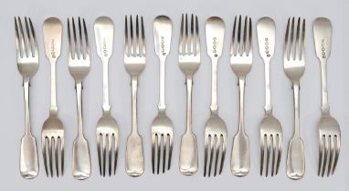 A set of twelve Victorian silver fiddle pattern table forks, by Thomas Hart Stone, Exeter 1863, 25.