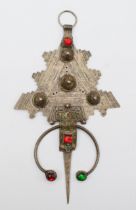 A 19th century Moroccan silver and enamel Amazigh fibula, set with red and green paste stones, 23.