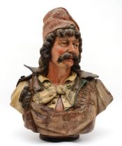 Attributed to Freidrich Goldschieder of Vienna, a late 19th century painted polychrome terracotta