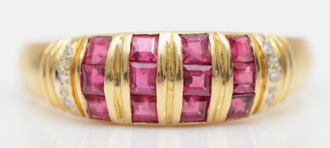 A 585 gold diamond and channel set ruby ring, S, 3.5gm.