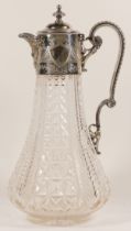 An early 20th century electroplate and pressed glass claret jug, with scrolling handle, bright cut
