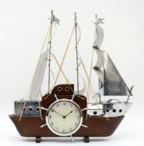 A mid 20th century mahogany and chrome plated mantle clock modelled in the form of a three mast