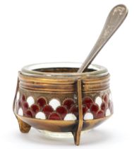 A Russian gilt metal and enamel open salt, post Revolution, with spoon, diameter 4.5cm