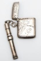 An Edwardian silver vesta case, Birmingham 1902 and a Victorian silver pencil holder, London 1899,