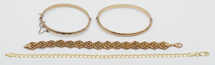 Two gold bonded to silver hinged bangles and two similar bracelets, 40gm