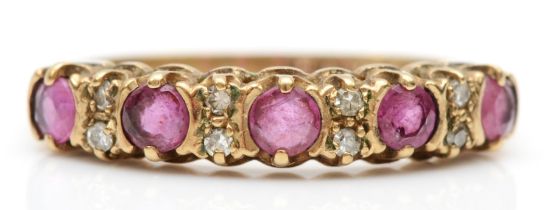 A 9ct gold ruby and eight cut diamond dress ring, I, 1.3gm.