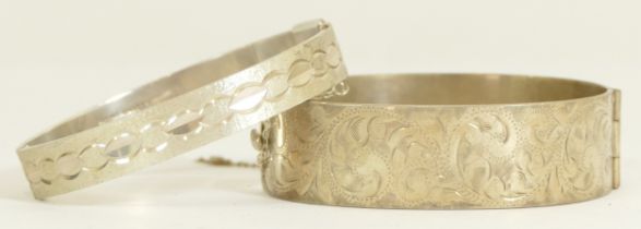 Two solid silver hinged bangles, Birmingham 1964 and 1973, 77gm