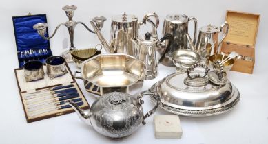 A silver three light two branch candelabra, Birmingham date letter worn, worn presentation dated