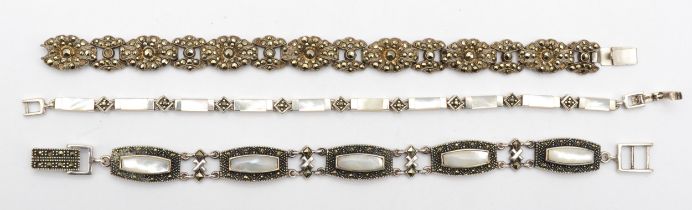 A Sterling Silver and marcasite cluster bracelet, 17cm and two other silver bracelets, 57gm