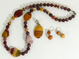 A hardstone bead suite, necklace ear rings and pendant.