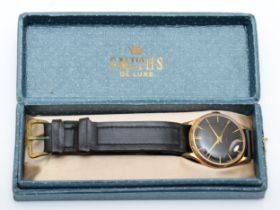 Smiths De Luxe, a gold plated manual wind gentleman's wristwatch, with black dial, 32mm, original