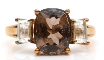A 9k gold three stone smokey quartz and white topaz dress ring, M, 2.7gm.