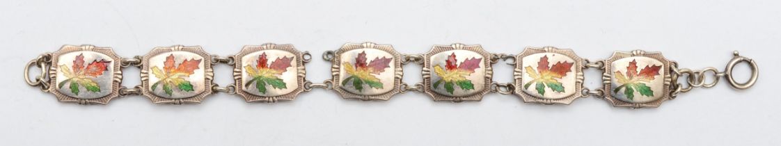 A Canadian silver and enamel maple leaf bracelet, stamped STERLING, BMCo, 18.5cm, 22gm, two links